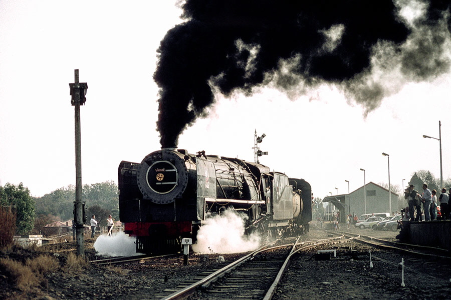 Class 15F 4-8-2 no. 2916 departing from Magaliesburg with a tourist train to Johannesburg.