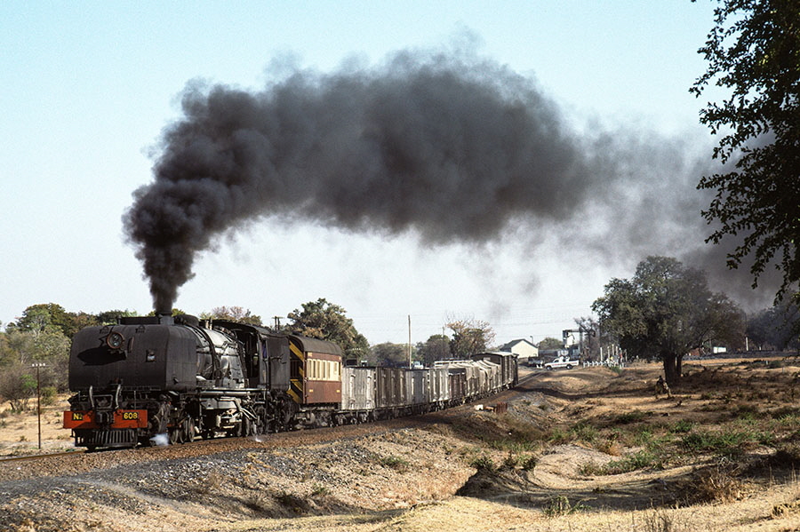 NRZ 16A class 2-8-2+2-8-2 'Garratt' no. 608 departs from Mbalabala, Zimbabwe, with a freight train 