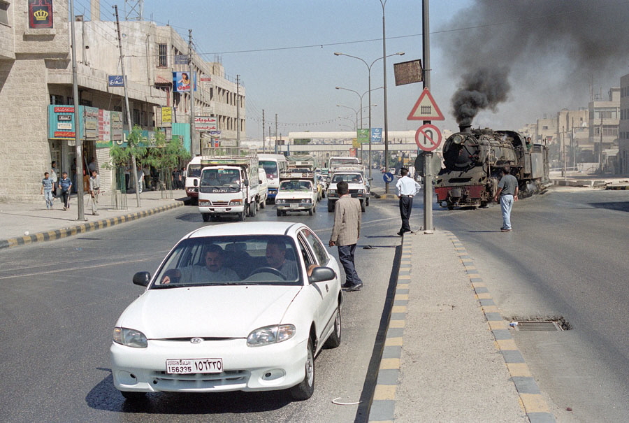 Steam locomotive 51 & train crossing road in Qasir, south of Amman, Hedjaz Railway, Jordan