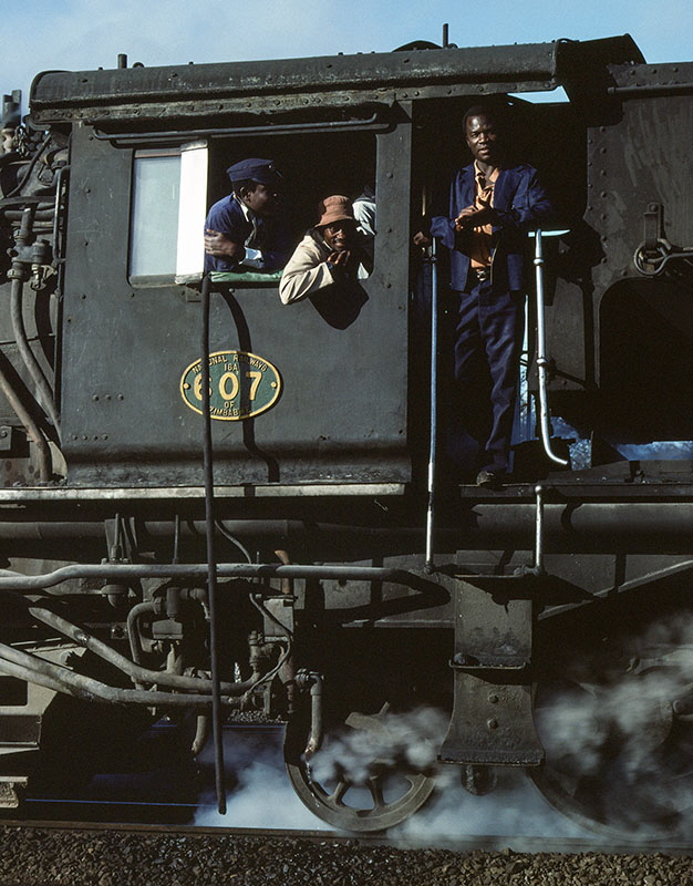 National Railways of Zimbabwe 'Garratt' steam locomotive 16A class 2-8-2+2-8-2 no. 607 and crew at Bulawayo locomotive shed, Zimbabwe,