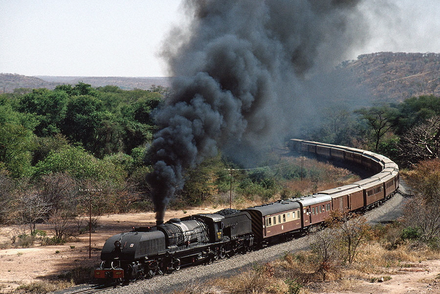 NRZ 15A class 4-6-4+4-6-4 'Garratt' locomotive no. 407 'Ukhozi' with the 'Union Limited Zambezi' tour train between Victoria Falls and Thomson Junction
