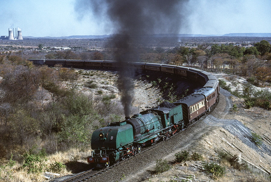 NRZ 16A class 2-8-2+2-8-2 'Garratt' no. 612 performs a run-past with the 'Union Limited Zambezi tour train just south of Thomson Junction, Zimbabwe