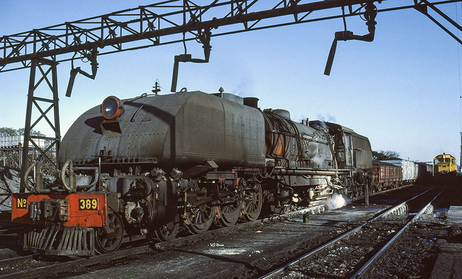 NRZ 15A class 4-6-4+4-6-4 'Garratt' steam locomotive no. 389 'Umziki' with a freight train at Dete, Zimbabwe
