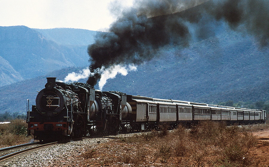 SAR class 19D 4-8-2 steam locomotives nos. 3323 & 3334 perform a run-past near Medike