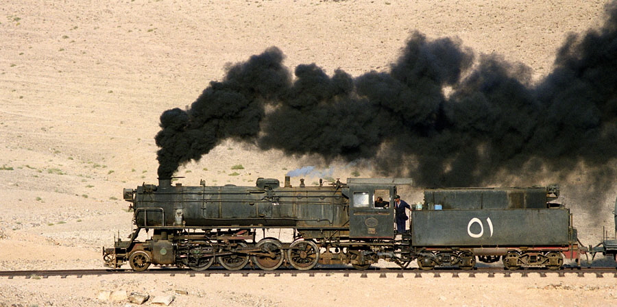 Steam locomotive 51 & train in desert, heading north from Qatrana to Amman, Hedjaz Railway, Jordan