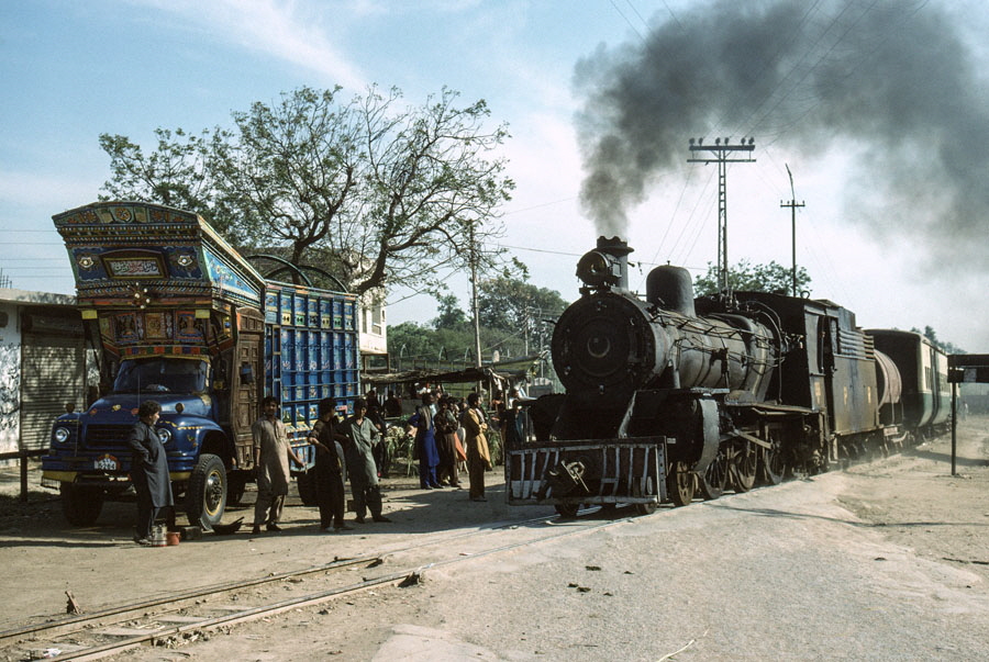Oil fired, meter gauge, class SP 4-6-0 138 departs from Jhudo, Pakistan, with a train heading back to Mirpur Khas