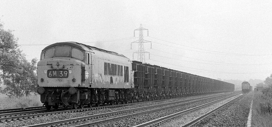 Class 46 "Peak" 1Co-Co1 diesel locomotive no.46002 with a train of "Presflo" wagons heading north on the Midland Main Line south of Loughborough