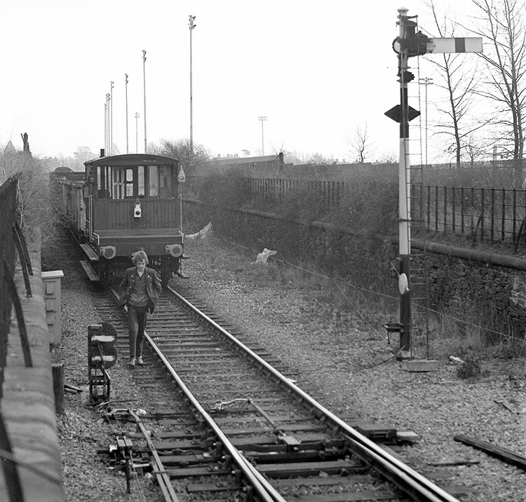 An 0-6-0 diesel shunter pauses at this junction near Saffron Lane, on the Leicester to Burton line, while propelling empty wagons to be loaded with scrap in the ex-Great Central goods yard
