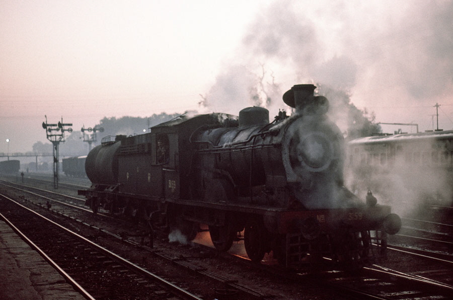 Broad gauge, oil fired, steam locomotive at Malakwal station, Pakistan, 21st December 1993