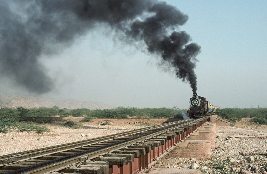 Broad gauge, oil fired, steam locomotive near Khewra, Pakistan, 21st December 1993