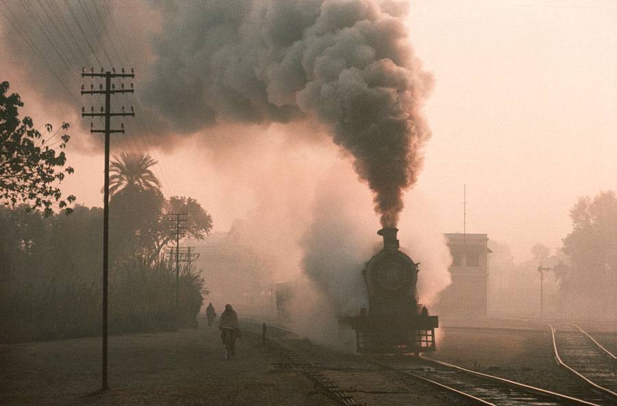 Broad gauge, oil fired, steam locomotive departs Malakwal, Pakistan, 22nd December 1993
