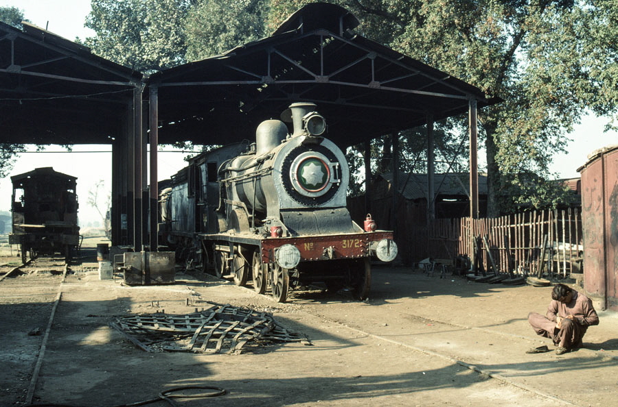 Broad gauge, oil fired, steam locomotive in Malakwal locomotive shed, Pakistan, 22nd December 1993.