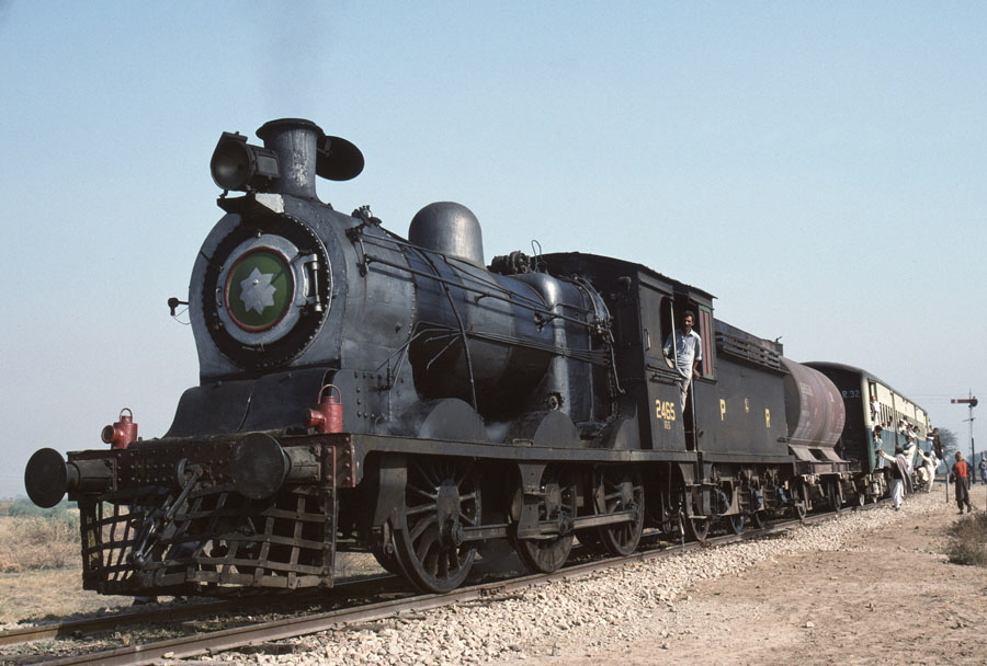 Broad gauge, oil fired steam locomotives, class SGS 0-6-0 2465 at Chalisa Junction, Pakistan, 22nd December 1993