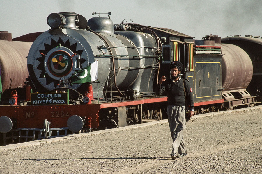 Broad gauge, oil fired, steam locomotive at Jamrud ready to head up the Khyber Pass with a train, Pakistan, 23rd December 1993