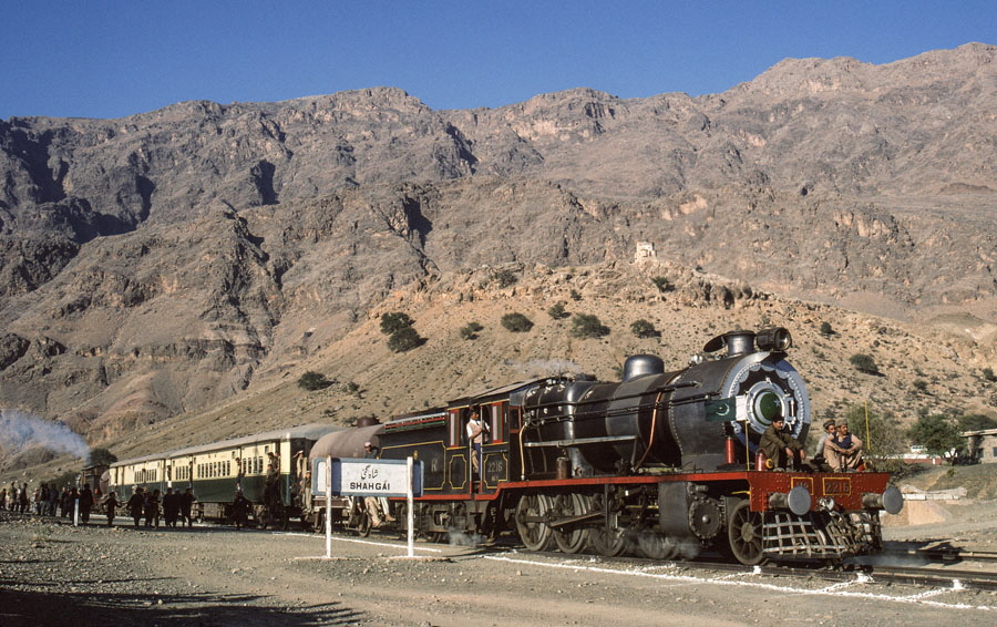 Broad gauge, oil fired, class HGS 2-8-0 locomotives prepare for a runpast with a charter train at Shahgai, on the Khyber Pass, 23rd December 1993
