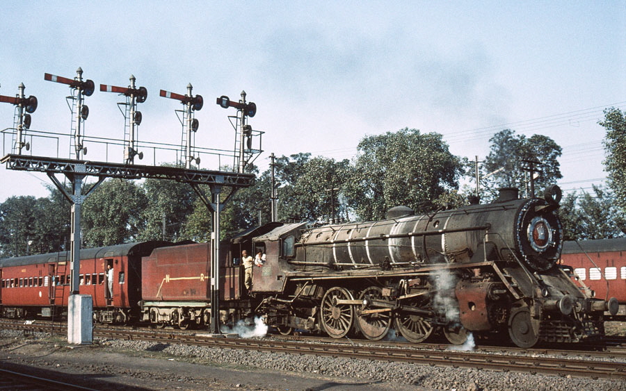 Broad gauge, steam locomotive, class WL 4-6-2 15051 departs Jalandhar station, India, with a local passenger train, 25th December 1993.