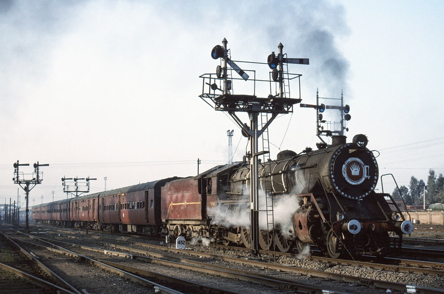 Broad gauge, steam locomotive, class WL 4-6-2 15023 departs Jalandhar station, India, with a local passenger train, 25th December 1993.