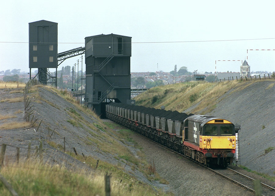 Class-58 with train loading coal at Coalfield Farm loader, near Coalville