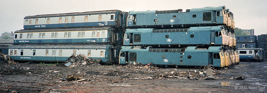 Coach & locomotive pile