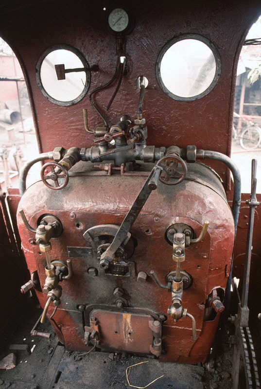 Cab of metre gauge steam locomotive, no. 8 “Tweed”, built by Sharp Stewart in 1873, at Saraya Sugar Mills, India, 28th December 1993.