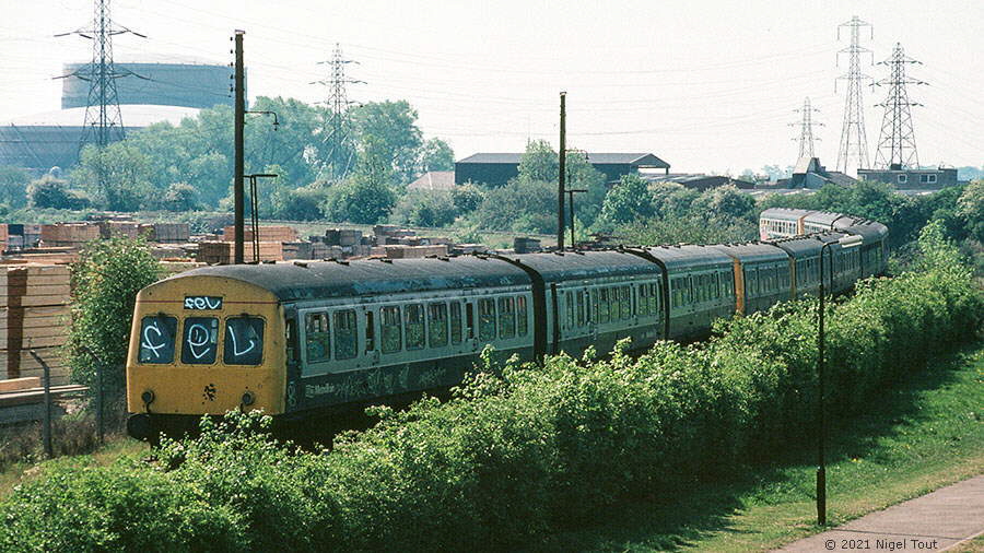 Diesel multiple units on chord to Burton line